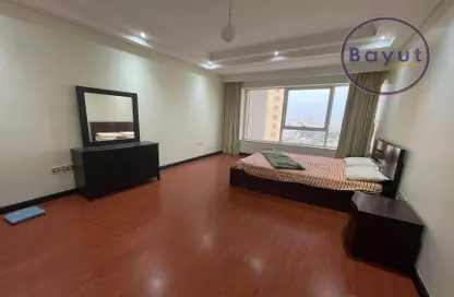 Room / Bedroom image for: Apartment - 1 Bedroom - 2 Bathrooms for sale in Abraj Al Lulu - Manama - Capital Governorate, Image 1