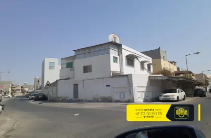 Outdoor Building image for: Villa - 5 Bedrooms - 7 Bathrooms for sale in Hamad Town - Northern Governorate, Image 1