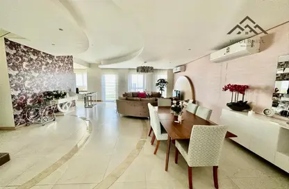Living / Dining Room image for: Villa - 3 Bedrooms - 4 Bathrooms for sale in Al Sidra - Diyar Al Muharraq - Muharraq Governorate, Image 1