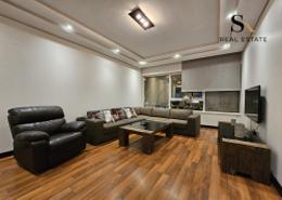 صورةغرفة المعيشة لـ: شقة - 2 غرف نوم - 3 حمامات للبيع في أبراج اللولو - المنامة - محافظة العاصمة, صورة 1