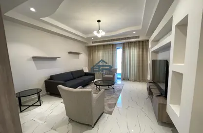 Living Room image for: Apartment - 1 Bedroom - 2 Bathrooms for rent in Busaiteen - Muharraq Governorate, Image 1