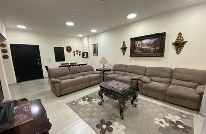Living Room image for: Apartment - 1 Bedroom - 2 Bathrooms for rent in Busaiteen - Muharraq Governorate, Image 1