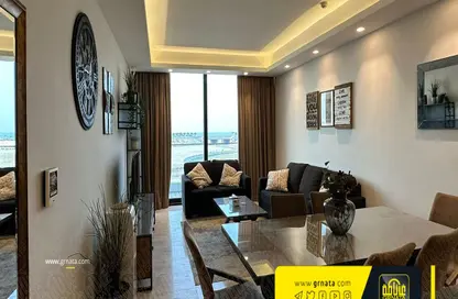 Living / Dining Room image for: Apartment - 2 Bedrooms - 3 Bathrooms for sale in Dilmunia Island - Muharraq Governorate, Image 1