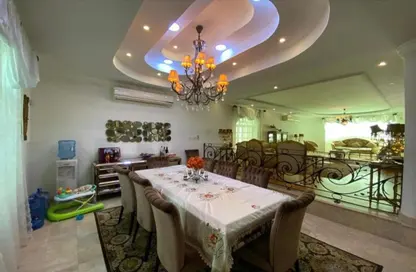 Dining Room image for: Villa - 4 Bedrooms - 5 Bathrooms for rent in Galali - Muharraq Governorate, Image 1