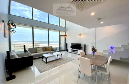 Living / Dining Room image for: Duplex - 3 Bedrooms - 4 Bathrooms for rent in Al Juffair - Capital Governorate, Image 1