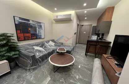 Living Room image for: Apartment - 1 Bathroom for rent in Zinj - Manama - Capital Governorate, Image 1