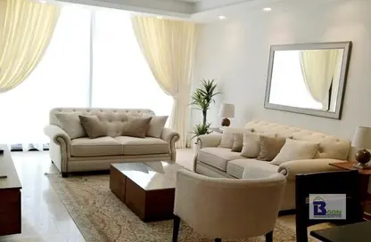 Living Room image for: Apartment - 2 Bedrooms - 3 Bathrooms for sale in Essence of Dilmunia - Dilmunia Island - Muharraq Governorate, Image 1