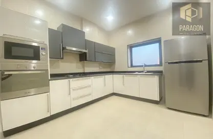 صورة لـ مطبخ شقة - 2 غرف نوم - 3 حمامات للايجار في الماحوز - المنامة - محافظة العاصمة ، صورة رقم 1
