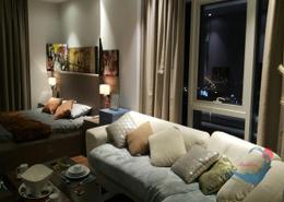 صورةغرفة المعيشة لـ: شقة - 1 غرفة نوم - 2 حمامات للبيع في السنابس - المنامة - محافظة العاصمة, صورة 1