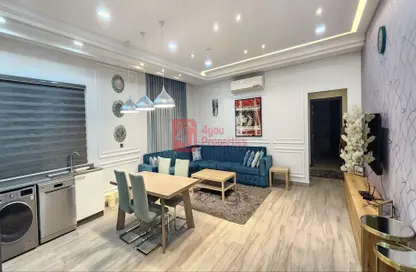 Living / Dining Room image for: Apartment - 2 Bedrooms - 2 Bathrooms for rent in Saar - Northern Governorate, Image 1