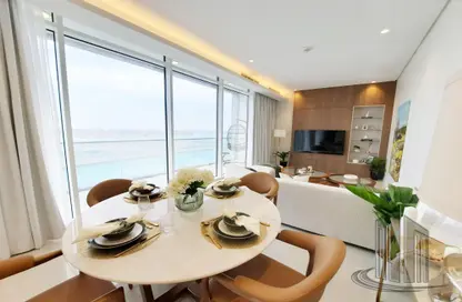 Living / Dining Room image for: Apartment - 1 Bedroom - 2 Bathrooms for sale in Canal View - Dilmunia Island - Muharraq Governorate, Image 1