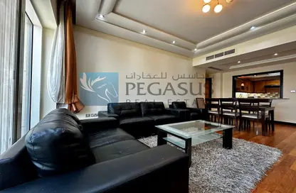 Living / Dining Room image for: Apartment - 2 Bedrooms - 2 Bathrooms for rent in Abraj Al Lulu - Manama - Capital Governorate, Image 1