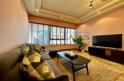صورة لـ غرفة المعيشة شقة - 2 غرف نوم - 3 حمامات للبيع في أبراج اللولو - المنامة - محافظة العاصمة ، صورة رقم 1