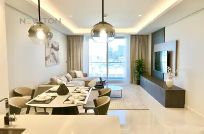 Living / Dining Room image for: Apartment - 1 Bedroom - 2 Bathrooms for rent in Canal View - Dilmunia Island - Muharraq Governorate, Image 1