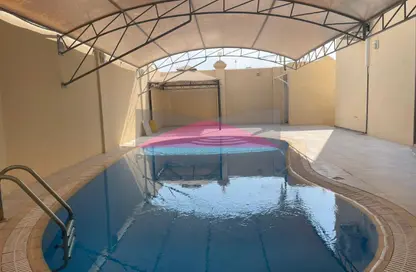 Compound - 4 Bedrooms - 6 Bathrooms for rent in Bu Ghazal - Manama - Capital Governorate