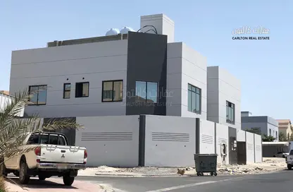 Outdoor Building image for: Villa - 7 Bedrooms for sale in Hamad Town - Northern Governorate, Image 1