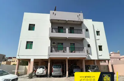 Outdoor Building image for: Whole Building - Studio for sale in Sanad - Central Governorate, Image 1