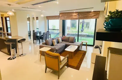 Living / Dining Room image for: Apartment - 2 Bedrooms - 3 Bathrooms for sale in Reef Island - Capital Governorate, Image 1