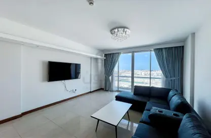 Living Room image for: Apartment - 1 Bedroom - 2 Bathrooms for rent in The Treasure - Dilmunia Island - Muharraq Governorate, Image 1