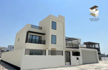 Outdoor Building image for: Villa - 5 Bedrooms - 5 Bathrooms for sale in Mozoon - Diyar Al Muharraq - Muharraq Governorate, Image 1