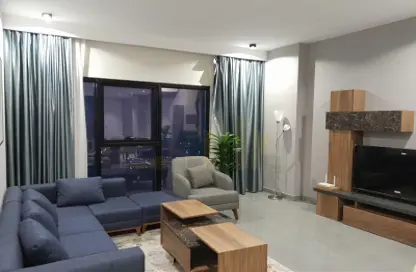 Living Room image for: Apartment - 1 Bedroom - 2 Bathrooms for rent in Manama Sea Front - Manama - Capital Governorate, Image 1