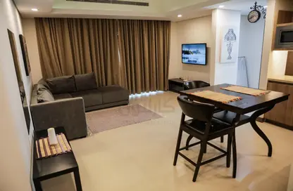 Living / Dining Room image for: Apartment - 1 Bedroom - 2 Bathrooms for sale in Busaiteen - Muharraq Governorate, Image 1