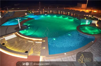 Pool image for: Apartment - 1 Bedroom - 2 Bathrooms for rent in Dilmunia Island - Muharraq Governorate, Image 1