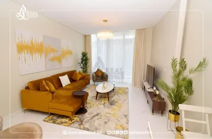 Living Room image for: Apartment - 2 Bedrooms - 4 Bathrooms for rent in Bahrain Bay - Capital Governorate, Image 1
