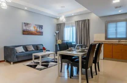 Living / Dining Room image for: Apartment - 2 Bedrooms - 3 Bathrooms for rent in Zinj - Manama - Capital Governorate, Image 1