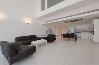 Living / Dining Room image for: Duplex - 1 Bedroom - 2 Bathrooms for rent in Al Juffair - Capital Governorate, Image 1