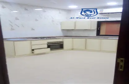 Kitchen image for: Apartment - 5 Bedrooms - 3 Bathrooms for rent in Muharraq - Muharraq Governorate, Image 1