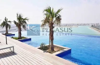 Pool image for: Apartment - 2 Bedrooms - 3 Bathrooms for sale in Essence of Dilmunia - Dilmunia Island - Muharraq Governorate, Image 1