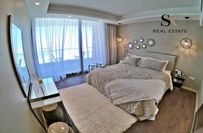 Room / Bedroom image for: Apartment - 1 Bedroom - 2 Bathrooms for sale in Essence of Dilmunia - Dilmunia Island - Muharraq Governorate, Image 1