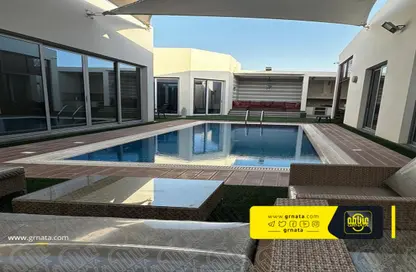 Pool image for: Villa - 3 Bedrooms - 4 Bathrooms for sale in Durrat Al Bahrain - Southern Governorate, Image 1