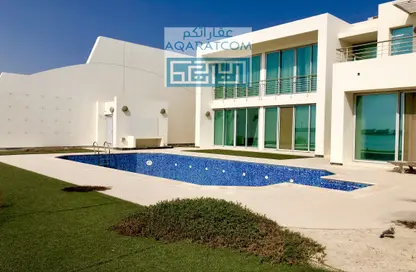 Pool image for: Villa - 4 Bedrooms - 5 Bathrooms for rent in Durrat Al Bahrain - Southern Governorate, Image 1