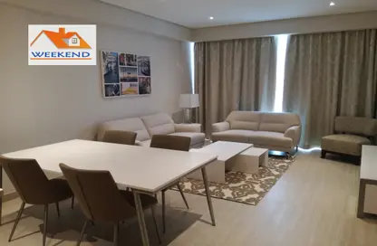 Living / Dining Room image for: Apartment - 1 Bedroom - 2 Bathrooms for rent in Um Al Hasam - Manama - Capital Governorate, Image 1