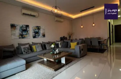 Living / Dining Room image for: Apartment - 4 Bedrooms - 4 Bathrooms for sale in Seef - Capital Governorate, Image 1