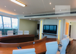 Office facing highway with gym and parking
