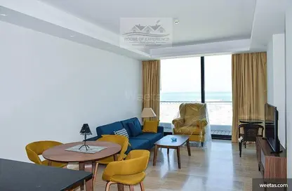 Living / Dining Room image for: Apartment - 1 Bedroom - 2 Bathrooms for rent in Dilmunia Island - Muharraq Governorate, Image 1