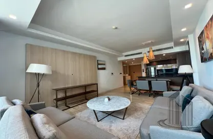 Living Room image for: Apartment - 2 Bedrooms - 3 Bathrooms for rent in Dilmunia Island - Muharraq Governorate, Image 1