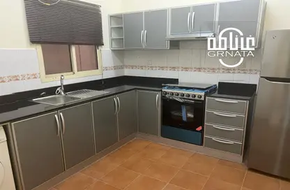 صورة لـ مطبخ شقة - غرفة نوم - 1 حمام للايجار في الماحوز - المنامة - محافظة العاصمة ، صورة رقم 1