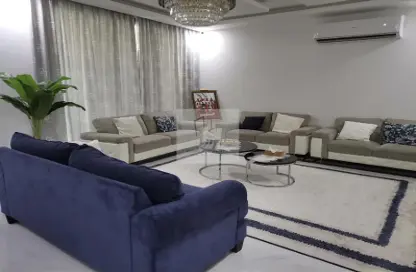 Living Room image for: Villa - 5 Bedrooms - 7 Bathrooms for sale in Diyar Al Muharraq - Muharraq Governorate, Image 1