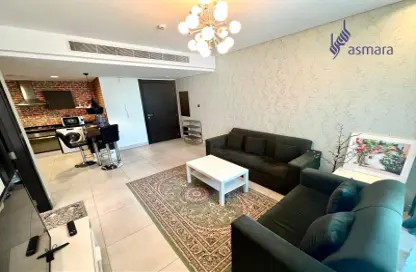 Living Room image for: Apartment - 1 Bedroom - 2 Bathrooms for sale in Exhibition Road - Hoora - Capital Governorate, Image 1