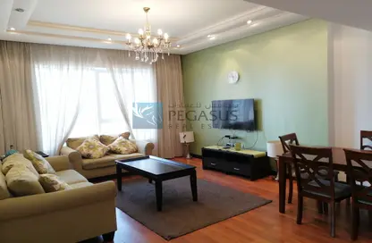 Living / Dining Room image for: Apartment - 2 Bedrooms - 2 Bathrooms for sale in Abraj Al Lulu - Manama - Capital Governorate, Image 1