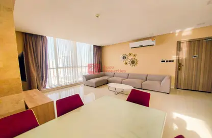 Living / Dining Room image for: Apartment - 2 Bedrooms - 3 Bathrooms for rent in Janabiya - Northern Governorate, Image 1