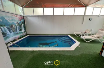 Villa - 4 Bedrooms - 7 Bathrooms for rent in Galali - Muharraq Governorate