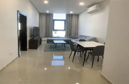 Living / Dining Room image for: Apartment - 2 Bedrooms - 2 Bathrooms for rent in Zinj - Manama - Capital Governorate, Image 1