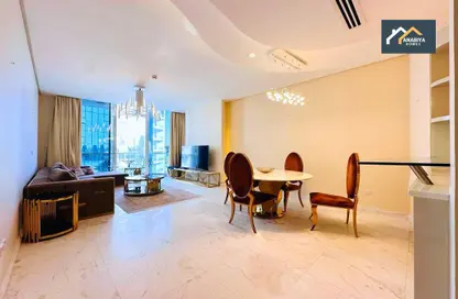 Living / Dining Room image for: Apartment - 2 Bedrooms - 3 Bathrooms for rent in Bahrain Bay - Capital Governorate, Image 1