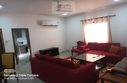 Living Room image for: Apartment - 2 Bedrooms - 2 Bathrooms for rent in Bu Kowarah - Riffa - Southern Governorate, Image 1