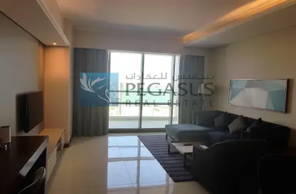 Living Room image for: Apartment - 2 Bedrooms - 3 Bathrooms for sale in Al Juffair - Capital Governorate, Image 1